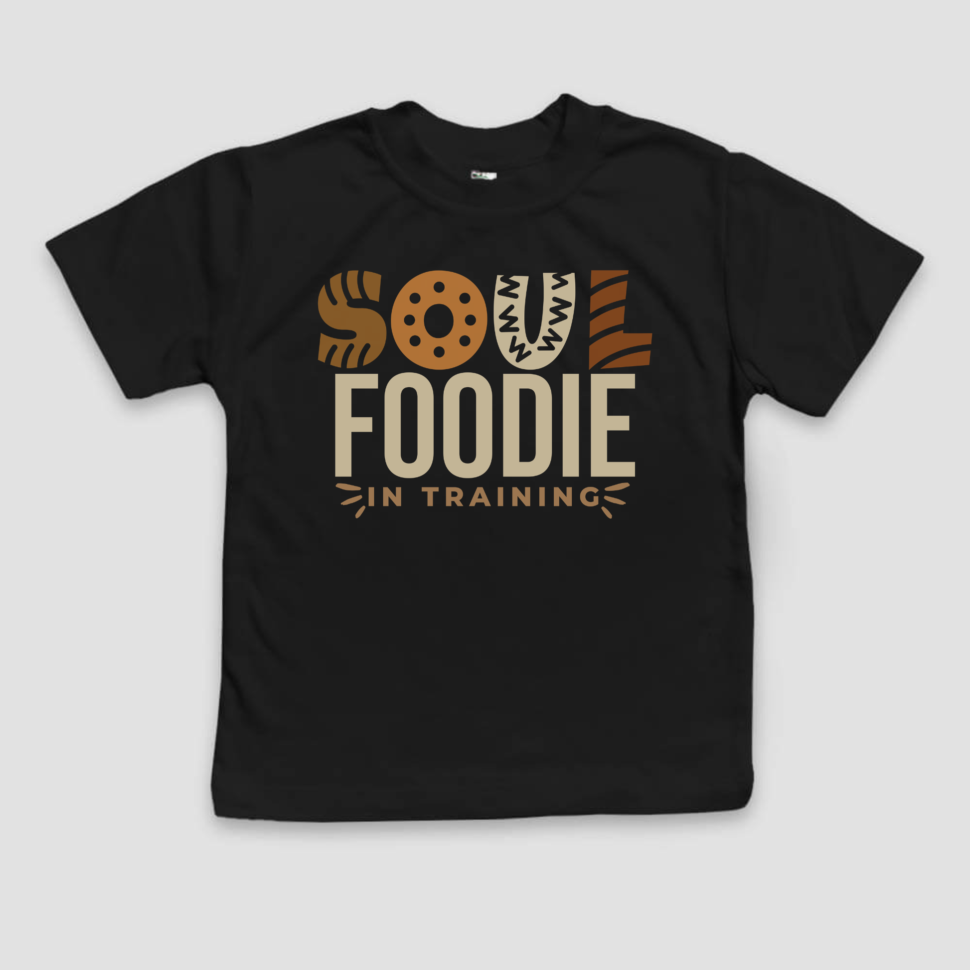 Black t-shirt with 'Soul Foodie in Training' text on a light gray background